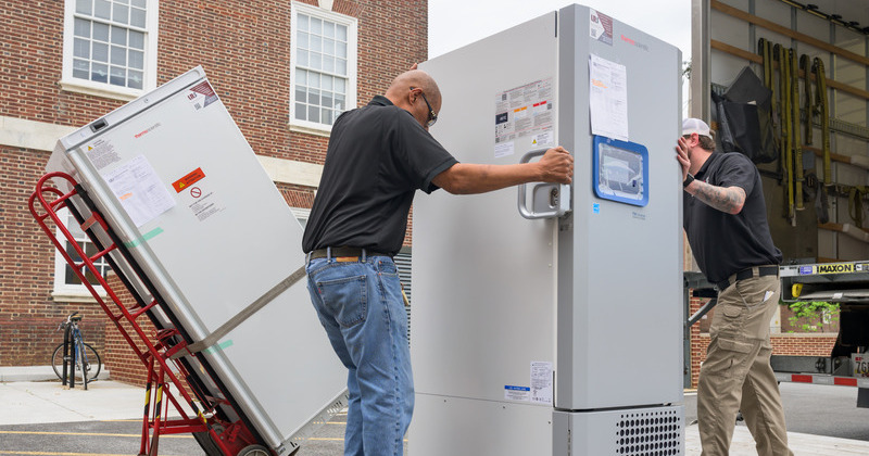 A new, more energy-efficient freezer is delivered to Melinda Duncan’s laboratory. The freezer is one of more than 120 cold storage units purchased with funding from Energize Delaware through an equipment upgrade program through Thermo Fisher Scientific. 