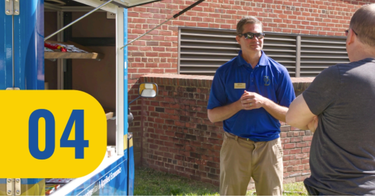 A taff member giving a tour.