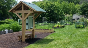 New Castle County Demonstration Garden Site with sign