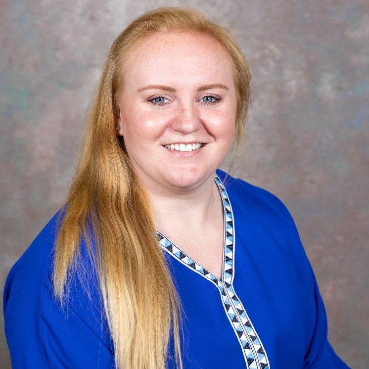 Headshot photo of Nicole Rehbach