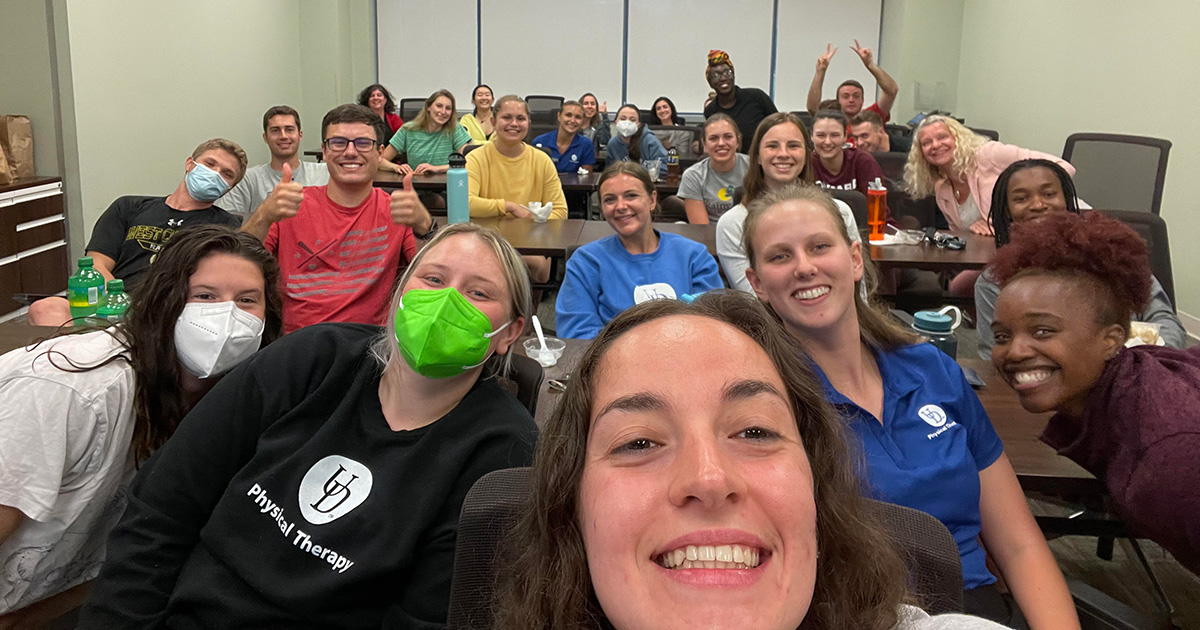 Group selfie of physical therapy students in a classroom waiting to learn the results of the VCU-Marquette Challenge