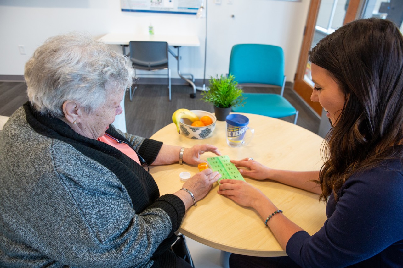 Alyssa Lanzi working with a patient