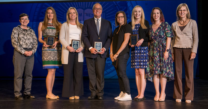 Group shot on stage after the Faculty Senate Excellence Awards.