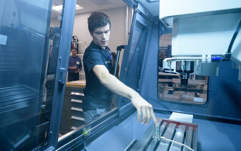 An employee working in one of UD's makerspaces