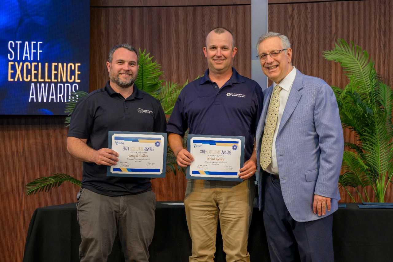 FREAS group photo Brian and Joe with President Assanis