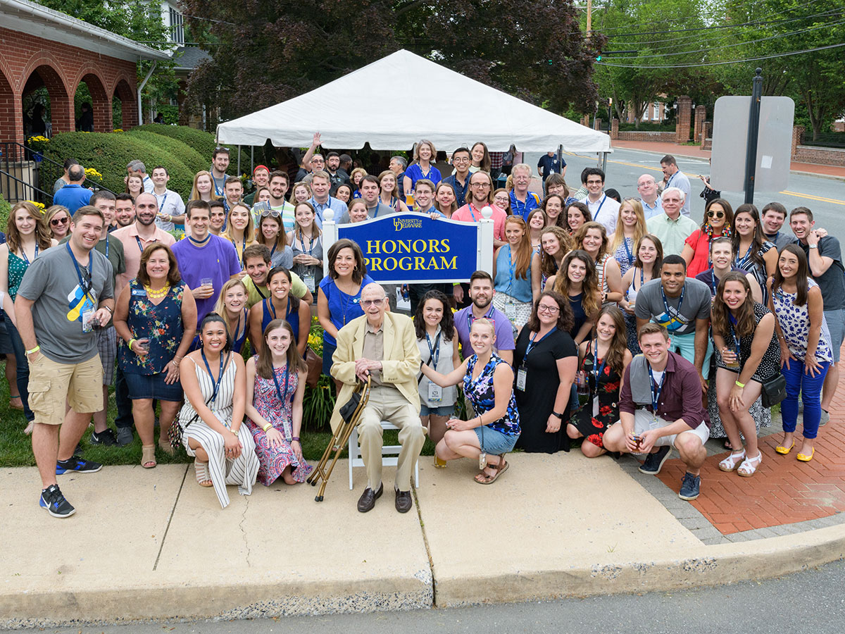 A group poses with Burnaby Munson in an archive image