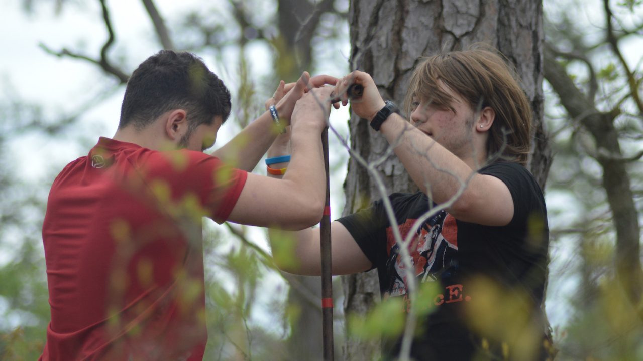 Students conducting coring tests in the field