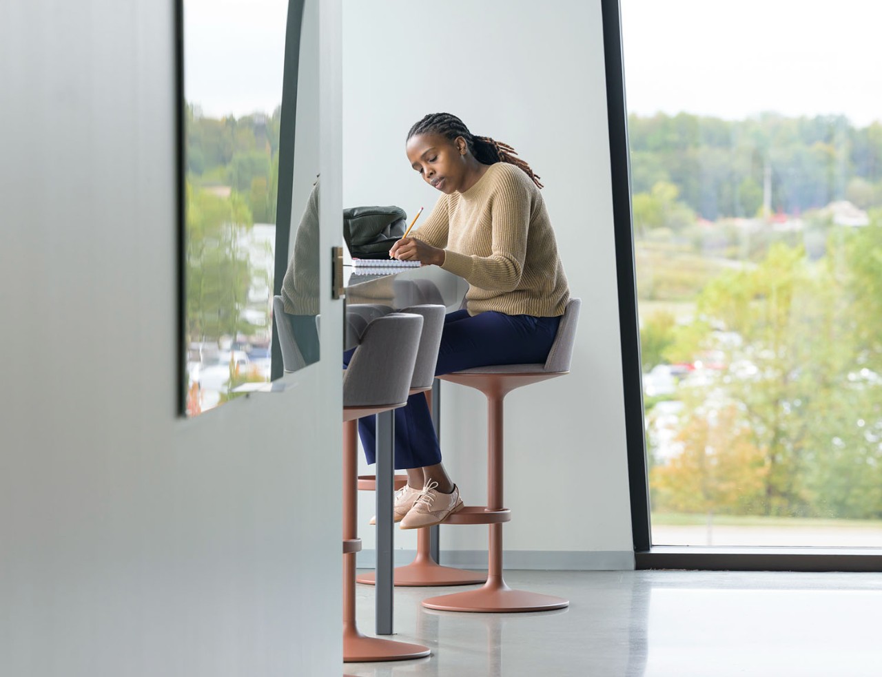 Lerner Student studying inside Fintech Building