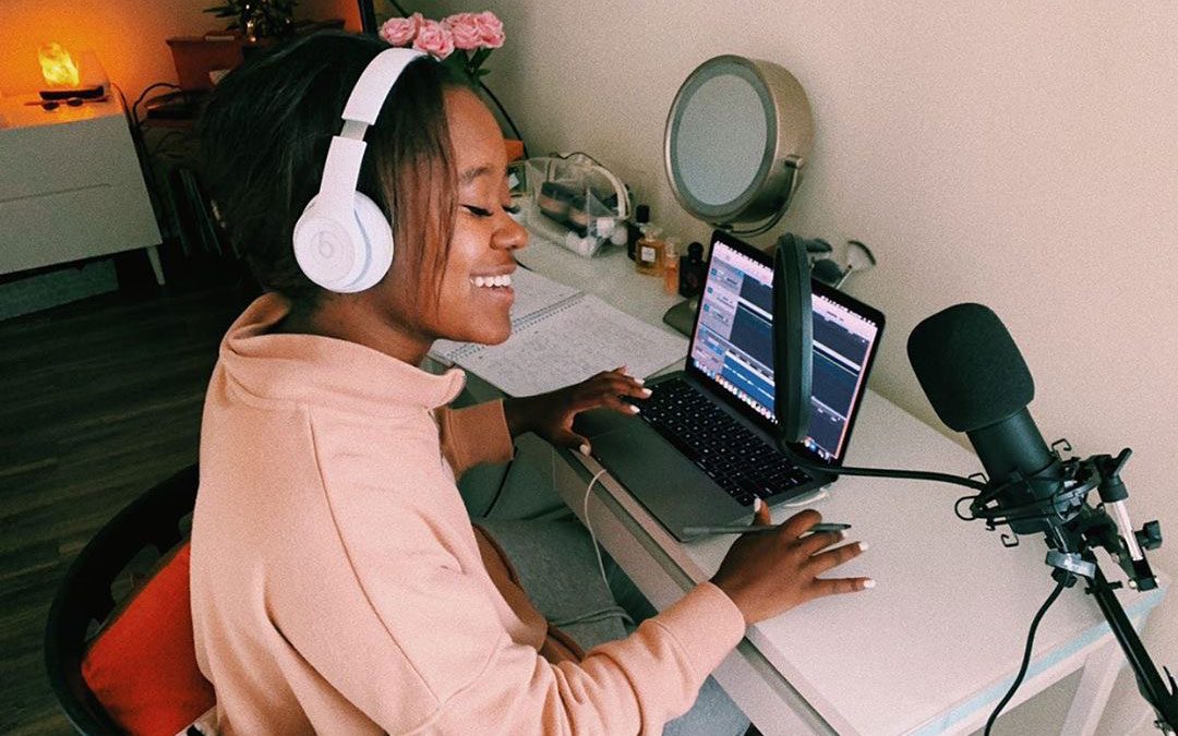 Shay with her podcasting equipment