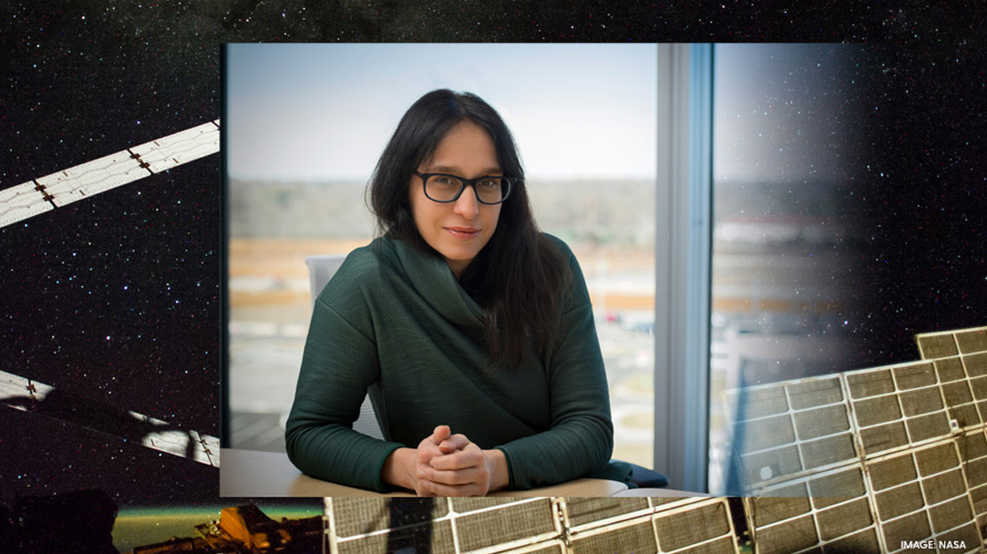 UD physicist Federica Bianco posing near a space-themed background.