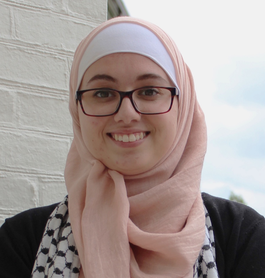 Headshot photo of Alexis Omar
