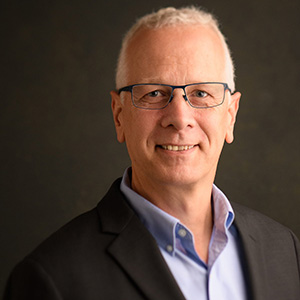 Headshot photo of Martin Brückner