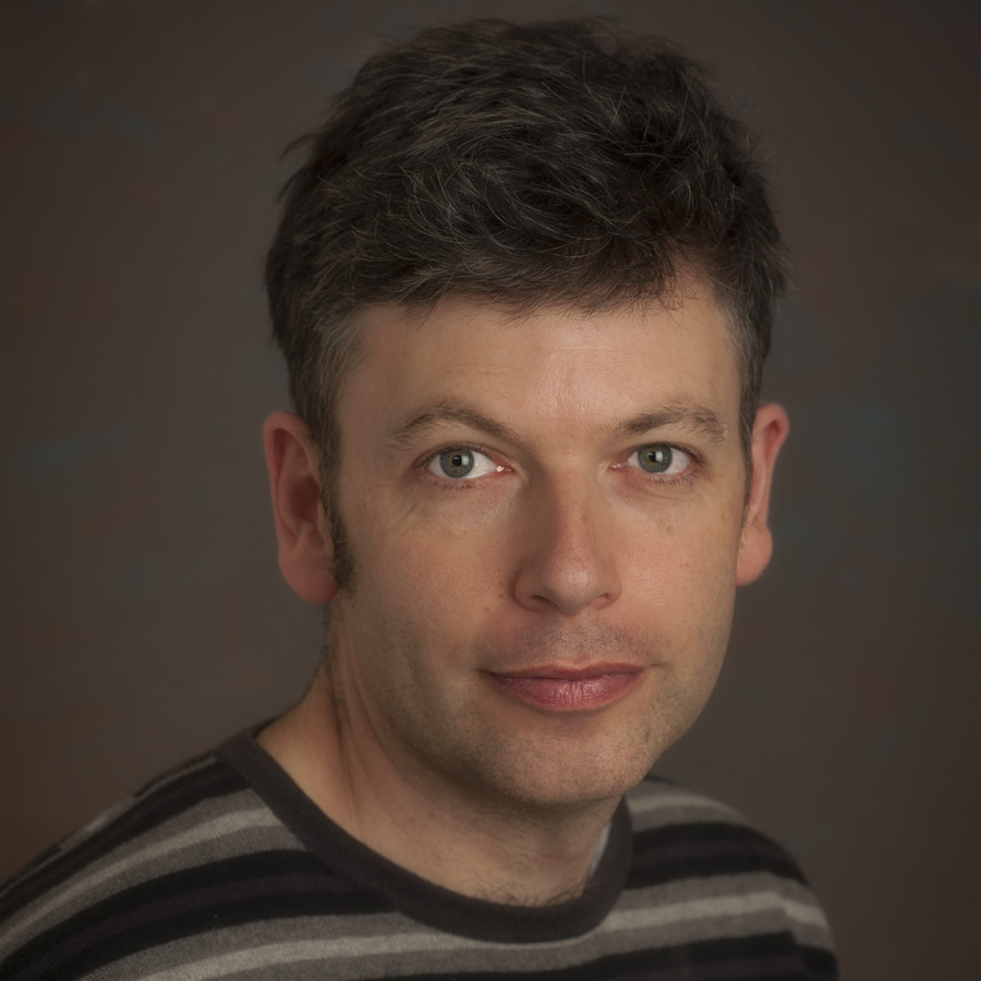 Headshot photo of Julian Yates