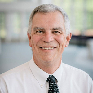 Photo of Mark Gockenbach speaking at a podium