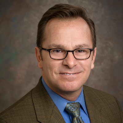 Photo headshot of Thomas M. Powers