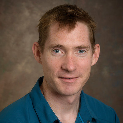 Photo headshot of Keith Schneider
