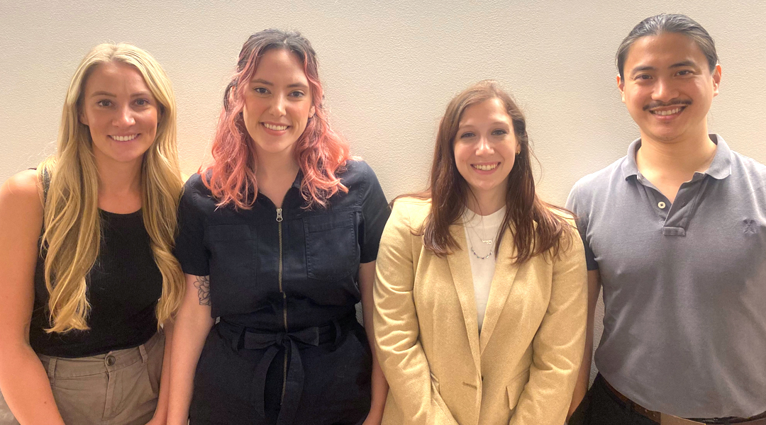 2023-24 Interns 2023-24 interns (Janessa Brown, Allison Coyne, Sherri Brunner, Ron Chau) pose together in front of a white wall