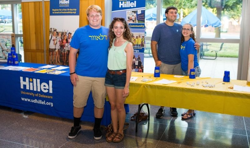 Students staff a Hillel information table