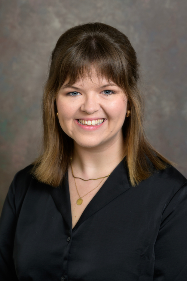 Smiling photo of AC Jen