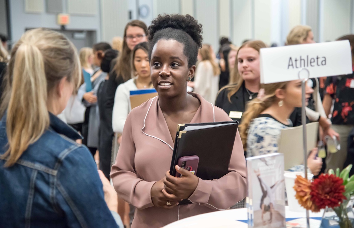 Student talks with employer at UD Career Fair