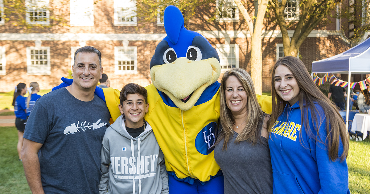 Family posing with YoUDee