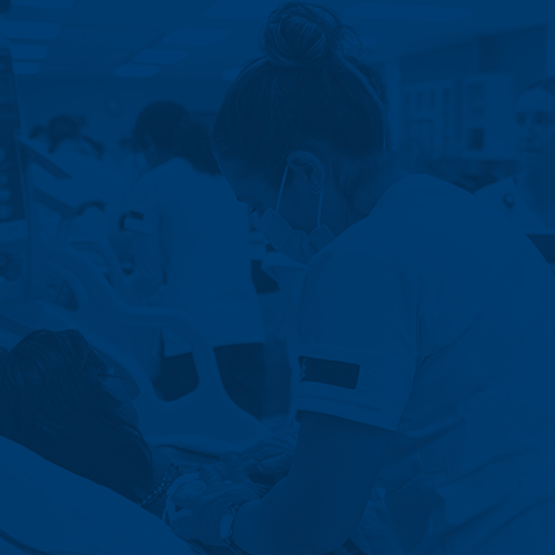 Student assisting a health care patient