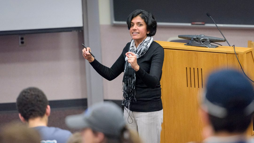 instructor leading class in a lecture hall