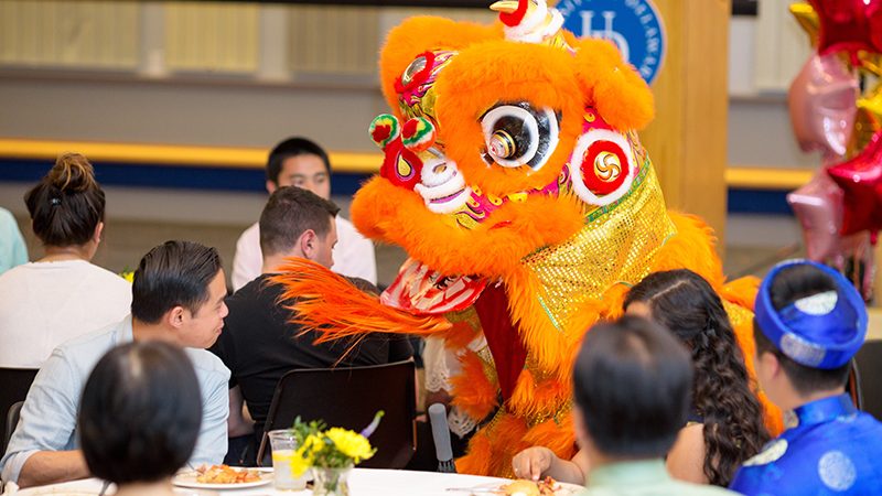 Colorful lion dance at the APIDA Year-End Celebration