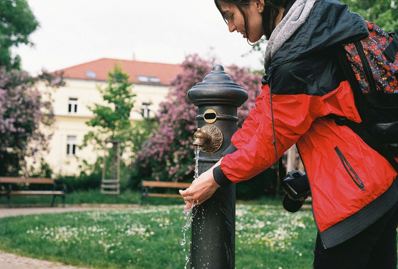 Traveler washing hands