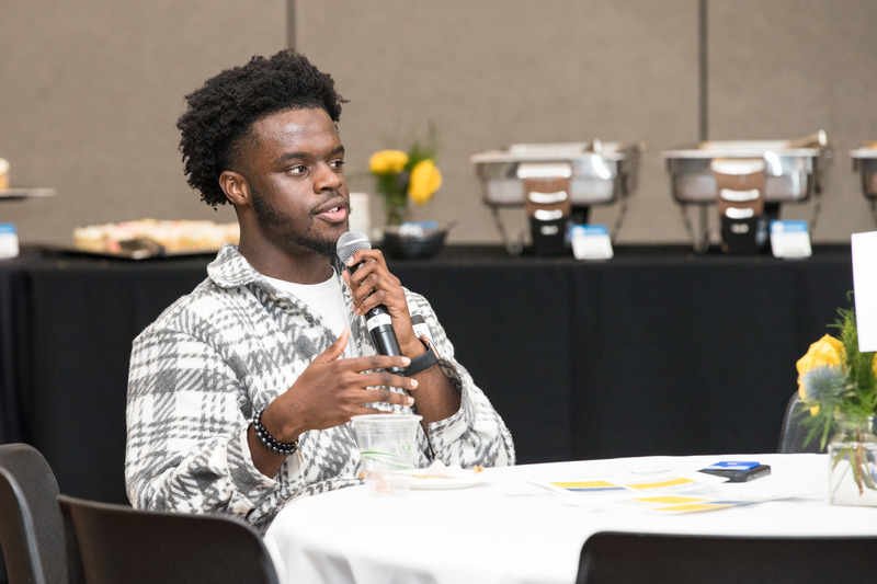 A male student speaks at the Moving Forward: Advancing Racial Equity and Inclusion event