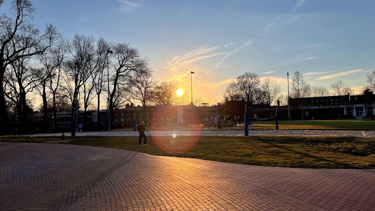 Picture of a sunset over the University of Delaware campus during the winter