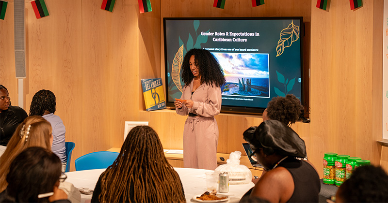 A student speaks at a Hot Takes Over Hot Plates discussion