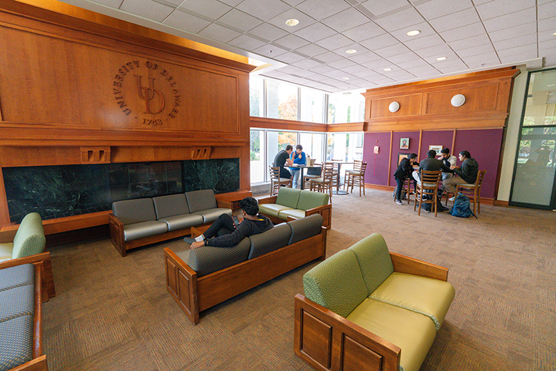 Students enjoy comfortable seating in the Graduate Student Lounge