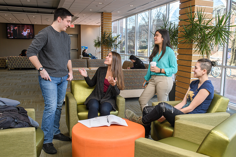 Students hanging out in the West Lounge