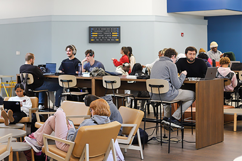 Students socializing in the Perkins Food Court