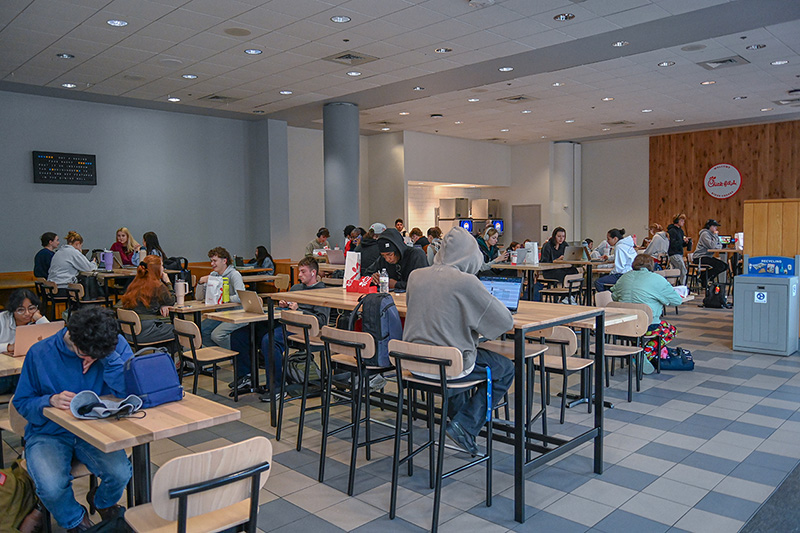 Students socializing in the Trabant Food Court