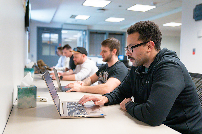 Students studying in the Veteran Lounge