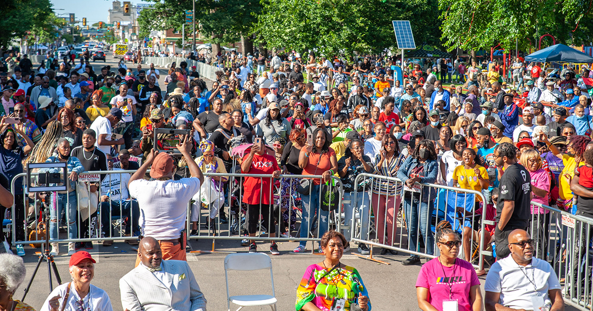 Juneteenth Philadelphia Parade and Festival attendees gather in street