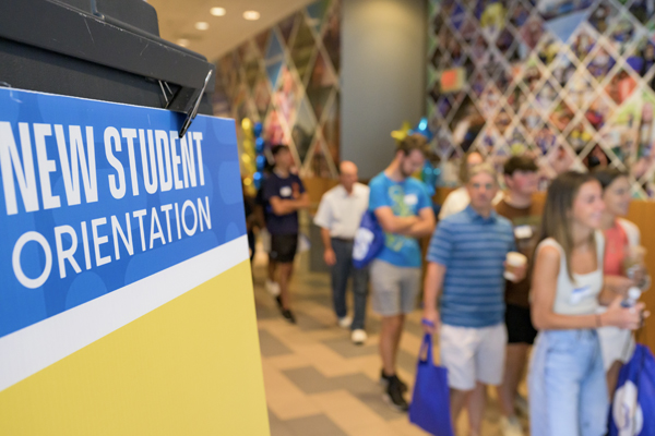 students line up to enter Trabant Multipurpose Room for New Student Orientation