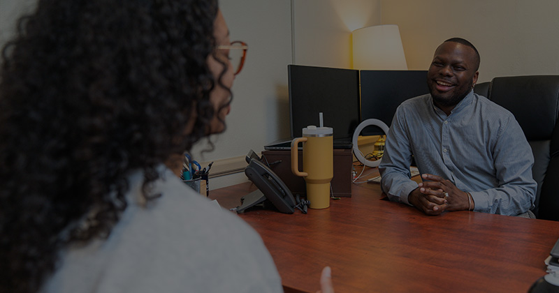 student meets with Student Advocacy & Support staff