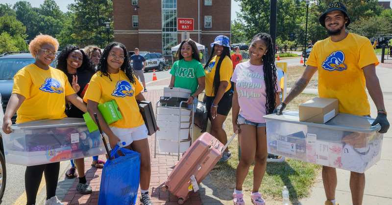 Students in the class of 2026 arriving on campus for new student move in. Thousands of freshman - nearly 4,300 new students in total - moved in to dorms all over campus.