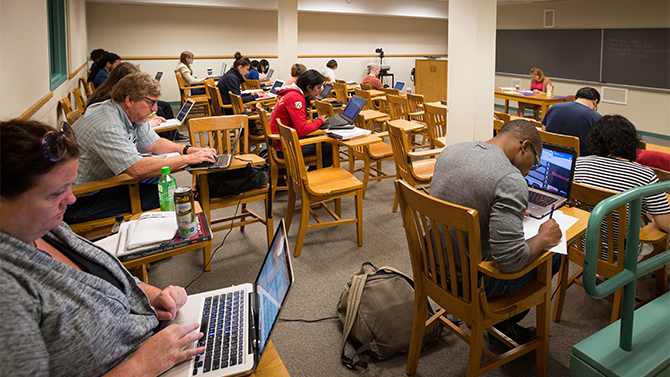 Dissertation Boot Camp - 2014 Professor Melissa Ianetta works with doctoral students on their dissertations at the Dissertation Boot camp sponsored by the Department of English.
