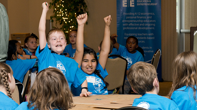 Photography for 2016 Meaningful Economics Competition, held at 205 Executive Drive, Newark, DE, Pencader Corporate Center which is on Rt. 896, 2 miles south of I- 95. 

Competition extends over four days with different grade levels competing on various dates and at two different locations (NC and Sussex counties), engaging approx. 350 third thru fifth grade students state-wide over the four days. 

On Tues., May 17thth, 25 teams made up of four THIRD grade students each will be competing at this Newark location. 

Will participate in three rounds of competition: written test, production activity, and entrepreneurial problem-solving; awards ceremony will follow. 

To be photographed: product production round where teams are given explicit instructions on producing a particular product within a prescribed period of time (portion of event will already be in progress when you arrive, having started at 9:40 and going thru 10:10), a written economics test round (10:15-10:45), a team problem solving round where teams will be asked to design and present their solution to the problem in the form of a product or service that they would create (10:50-11:40); and a portion of the presentations where students will pitch their product or service to judges. Judging begins at 11:30 so you can cover first 20 minutes (judging continues through 1:15). Other ME activities and an awards session will follow but will not be photographed.