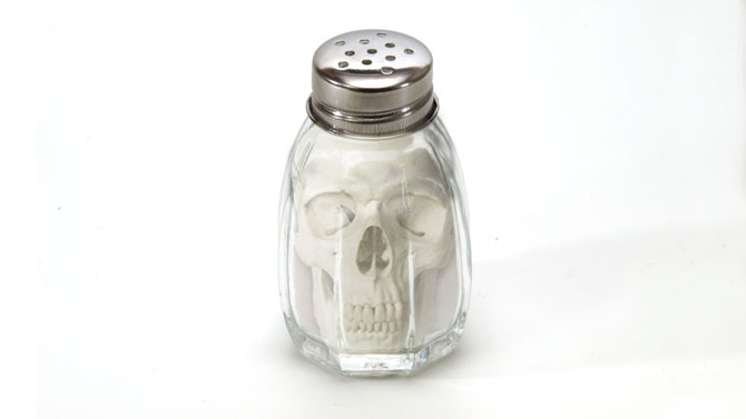 PT-PlaySkin_Lift-Garment_Study-040616 Salt tumbler with skull inside indicating the danger of overconsumption