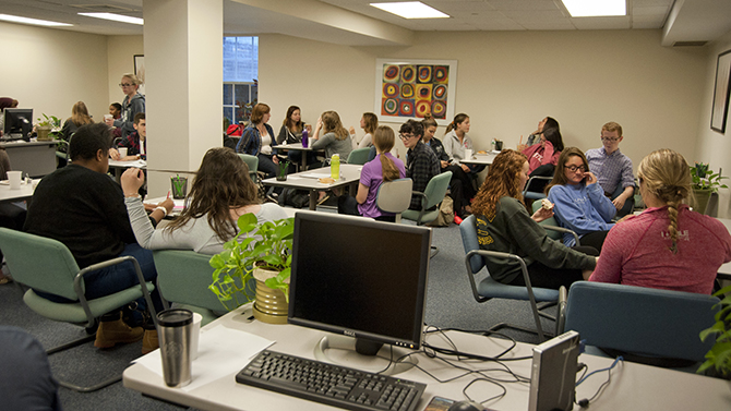 Professional Development Meeting - Writing Center English tutors at the writing center have a professional development meeting in Memorial Hall under the direction of Michael McCamley.