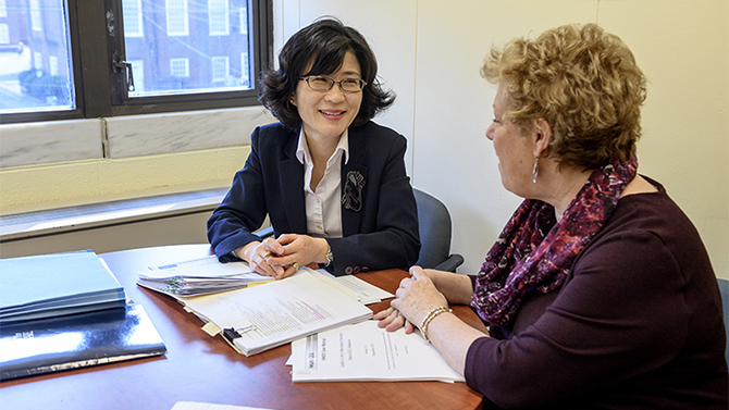 Barbara Habermann mentors junior faculty member Ju Young Shin on some collaborating research for the College of Health Sciences.