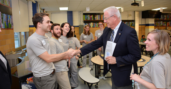 State Representative Harvey Kenton meets the UD student volunteers at Sussex Science Night (3992) at Sussex Middle School. Event sponsored by Delaware Biotechnology Institute.

