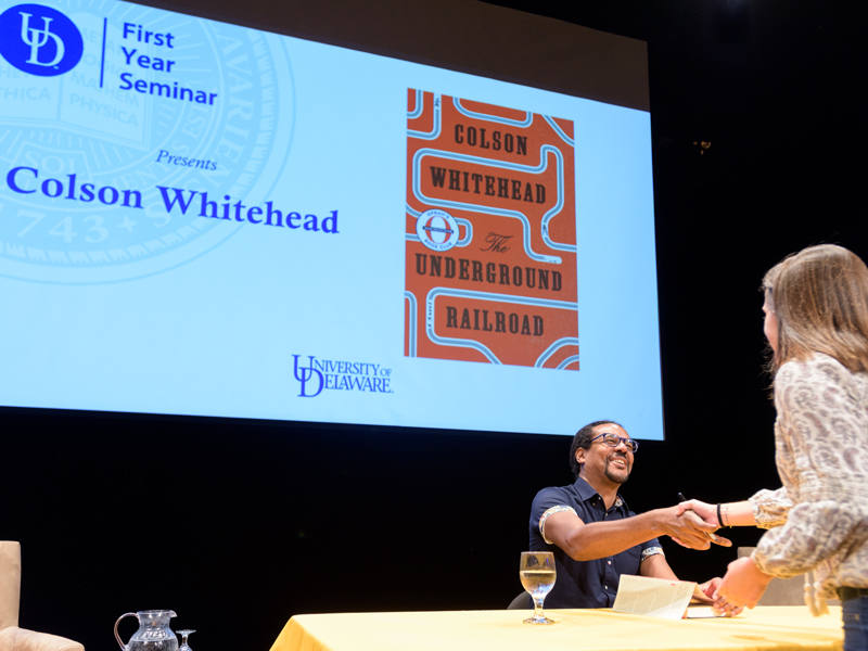 Novelist Colson Whitehead greets a student at UD, where he spoke on Tuesday, Oct. 3, 2017. Whitehead’s novel, The Underground Railroad, is UD’s First Year Common Reader and won the 2017 Pulitzer Prize for fiction.
