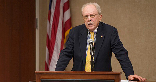 Raymond Callahan at lectern An expert on military history, Callahan taught at UD for 38 years and served as director of the Master of Arts in Liberal Studies program and as associate dean of the College of Arts and Sciences. He held the John F. Morrison Chair of Military History at the U.S. Army's Command and General Staff College and is a Fellow of the Royal Historical Society.
Callahan has written six books, including Churchill and His Generals, and most recently Triumph at Imphal-Kohima: How the Indian Army Finally Stopped the Japanese Juggernaut. His doctoral and master's degrees are from Harvard University; his bachelor's degree is from Georgetown University.