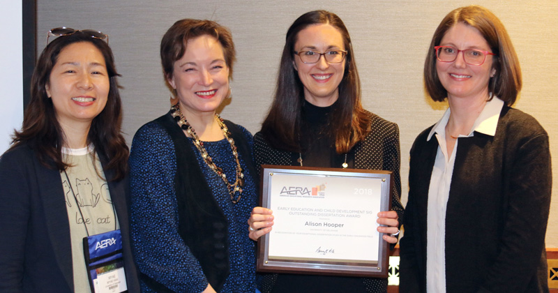 As faculty members on Alison Hooper’s dissertation committee, HDFS professors Myae Han (left) and Martha Buell (second to left) joined Hooper and AERA award presenter Katherine Delaney (far right). 